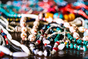 Colorful braided bracelets with various beads