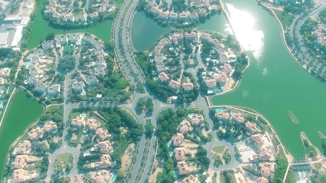 Aerial view of Jumeirah Islands community villas pattern in Dubai, United Arab Emirates