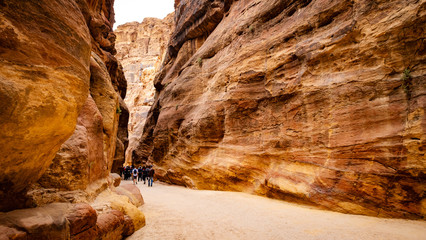 Beatiful gorge in Petra, Jordan with large crowd of tourists