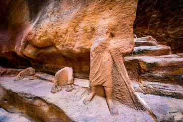 Underground ancient rock carving of a royal tomb in Petra, Jordan