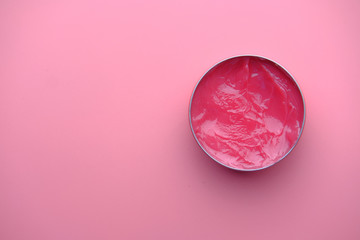 close up of petroleum jelly on pink background 