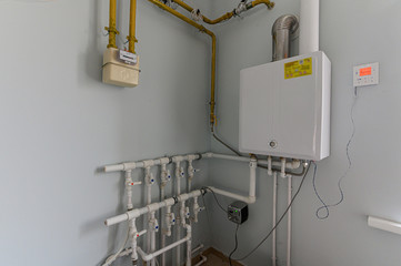 Russia, Moscow- November 04, 2019: interior room apartment boiler room. heating system, pipes and appliances