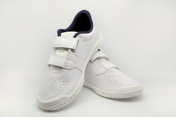 white sneakers on a white background