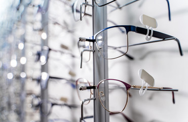 Eyeglasses shop. Showcase with spectacles in modern ophthalmic store.
