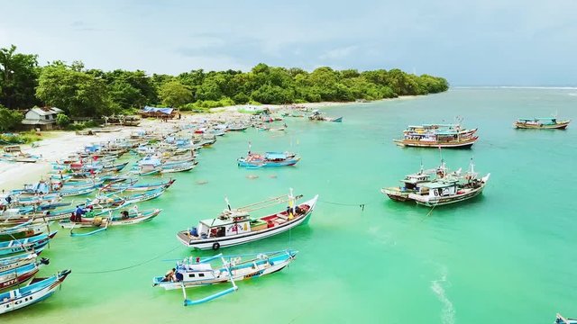 Anchored fisherman boats on Ujung Genteng beach