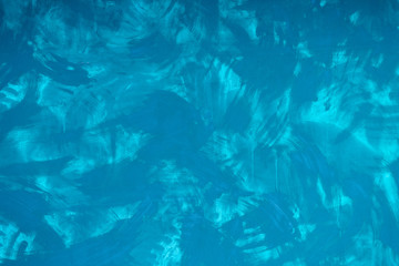 blue streaks of watercolor paints closeup. Color paint background