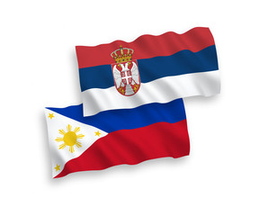 Flags of Philippines and Serbia on a white background