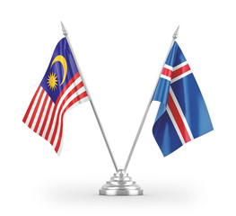 Iceland and Malaysia table flags isolated on white 3D rendering