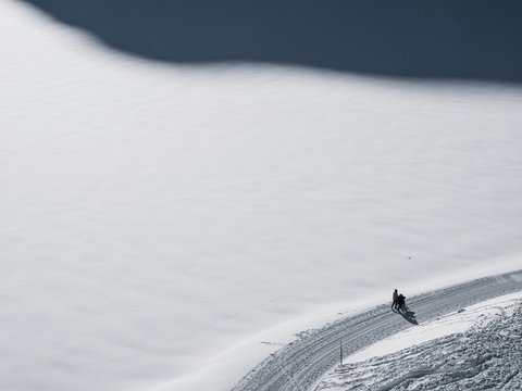 view from above of a track in the snow 