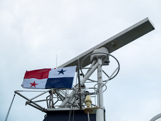 Panama City, Panama, 09 March, 2013: Panama flag raised on the mast of the merchant vessel.