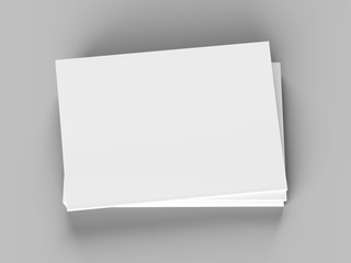 Open magazines with a glued binding. Stack of catalogues. Vertical A4 format. 3d illustration.