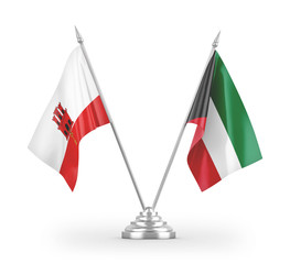 Kuwait and Gibraltar table flags isolated on white 3D rendering