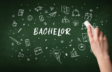 Hand drawing BACHELOR inscription with white chalk on blackboard, education concept