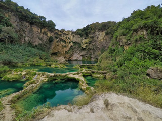 Unbelievable summer morning scene on the Waterfall (EL SALTO-EL MECO) san luis potosi Mexico,Colorful sunrise . Beauty of nature concept background.