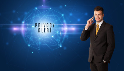 Businessman thinking about security solutions with PRIVACY ALERT inscription