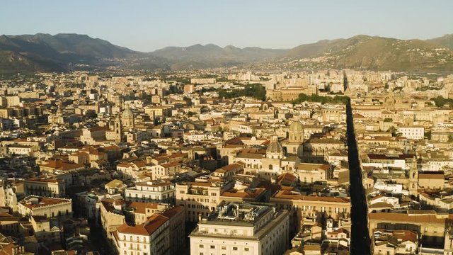 Flight in the historic part of Palermo, early sunny morning over the Corso Vittorio Emanuele, Cattadrale Santa Vergine Maria Assunta, Palazzo dei Normanni. Sicily, Italy. May 2019. Aerial shot
