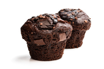 Dark chocolate muffins isolated on white