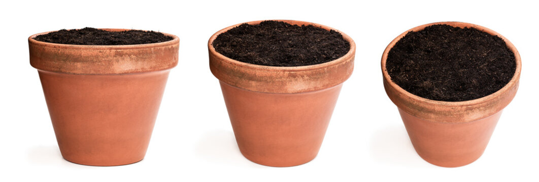 Set of old ceramic flower pot with soil isolated on white