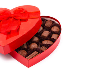 A Red Love Heart Box of Valentines Chocolates Isolated on a White Background