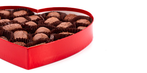 A Red Love Heart Box of Valentines Chocolates Isolated on a White Background