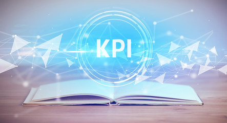 Open book with KPI abbreviation, modern technology concept