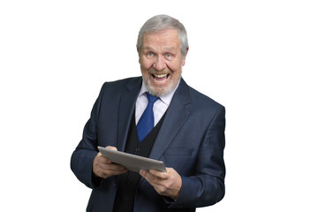 Portrait of happy businessman with tablet. Cheerful laughing man in business suit. White isolated background.