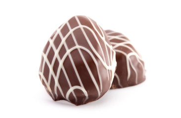 An Egg Shaped Chocolate Truffle Isolated on a White Background