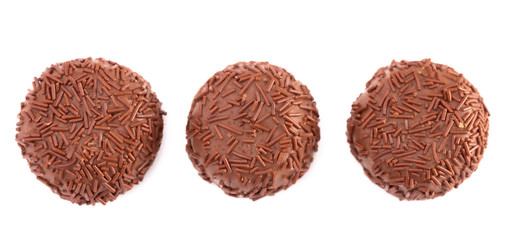 Three Milk Chocolate Truffles in a Row on a White Background