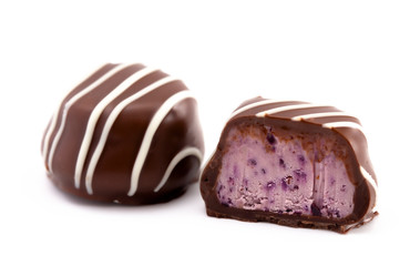 Chocolate Blueberry Truffle Cut Open and Isolated on a White Background