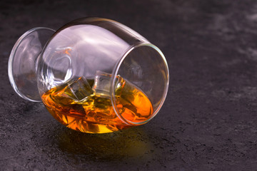 glass of cognac on a black background.Copy space	
