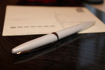 pen and postcard