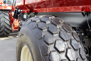 Closeup of big black rubber wheels
