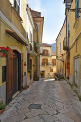 Sant'Agata de 'Goti, Italy, 02/29/2020. A narrow street between old houses of a medieval village.