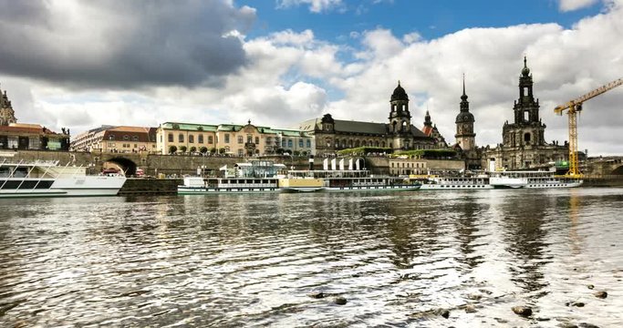 Skyline time lapse of the city of Dresden, hyper lapse on the river elbe with view over the old town of Dresden, Saxonia, Germany, Panorama view of the Frauenkirche and the zwinger on the river Elbe 