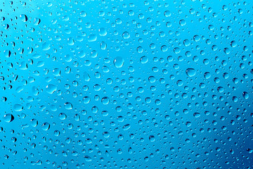 drops of water on a glass of bruise color