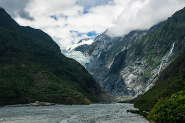 Naklejka na ściany i meble hiking towards the franz josef glacier in new zealand