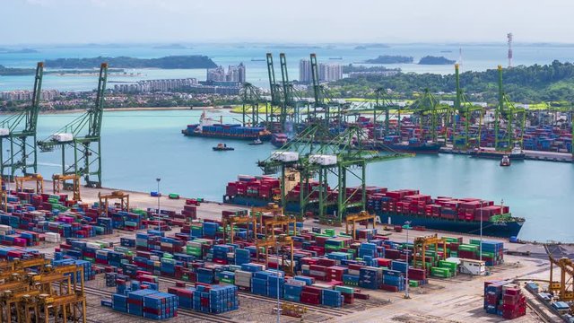 4kTime lapse of commercial shipping freight travel business cargo at Singapore