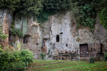 Fototapeta na wymiar Outside of the Mitreo (Madonna del Parto church) dug out of tuff rock in Sutri, province of Viterbo, Lazio, Italy