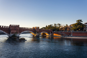 The Castelvecchio bridge, also known as the Scaliger bridge, is a Verona bridge over the Adige river which is part of the Castelvecchio fortress