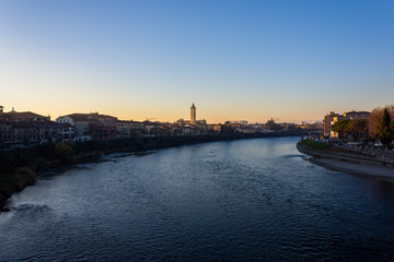 Fototapeta na wymiar View of Verona and the Adige river from the Castelvecchio bridge, also known as the Scaliger bridge