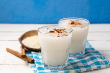 Mexican rice horchata with cinnamon on white background