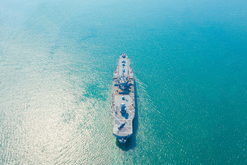 Navy aircraft carrier on the open sea Aerial view of battleship, Military sea transport, Military Navy Rescue Helicopter on board the battleship deck  © AU USAnakul