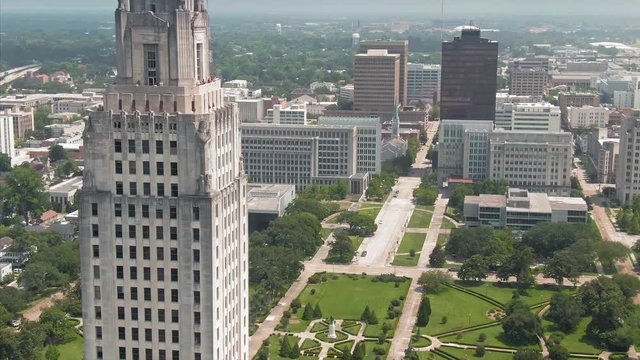 Aerial: Louisiana State Capitol building in downtown Baton Rouge, Louisiana, USA. 23 June 2019