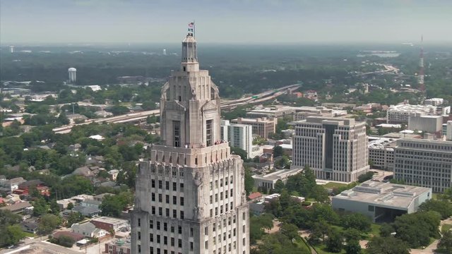 Aerial: Louisiana State Capitol building in downtown Baton Rouge, Louisiana, USA. 23 June 2019
