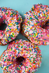 Pink donuts on blue background