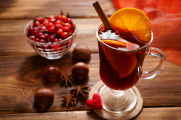 Tasty chestnuts and mulled wine with berries.