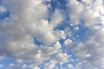 Obraz premium sunlit clouds in a blue sky