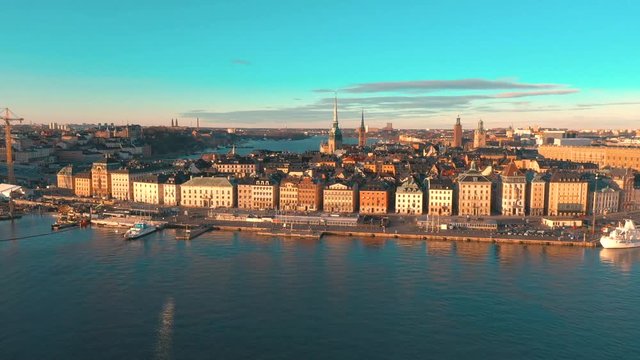 STOCKHOLM, SWEDEN - FEBRUARY, 2020: Aerial view of Stockholm city centre Gamla stan. Flying over buildings in old town.