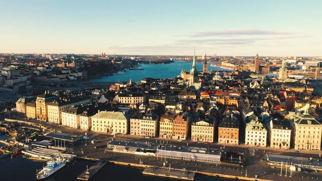 STOCKHOLM, SWEDEN - FEBRUARY, 2020: Aerial view of Stockholm city centre Gamla stan. Flying over buildings in old town.