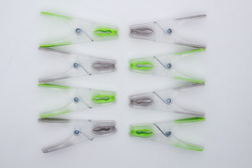 A clothespin or clothes peg is used to hang up clothes for drying, normally on a clothes line. Clothespins often come in many colors and different designs. Can be in plastic or wooden